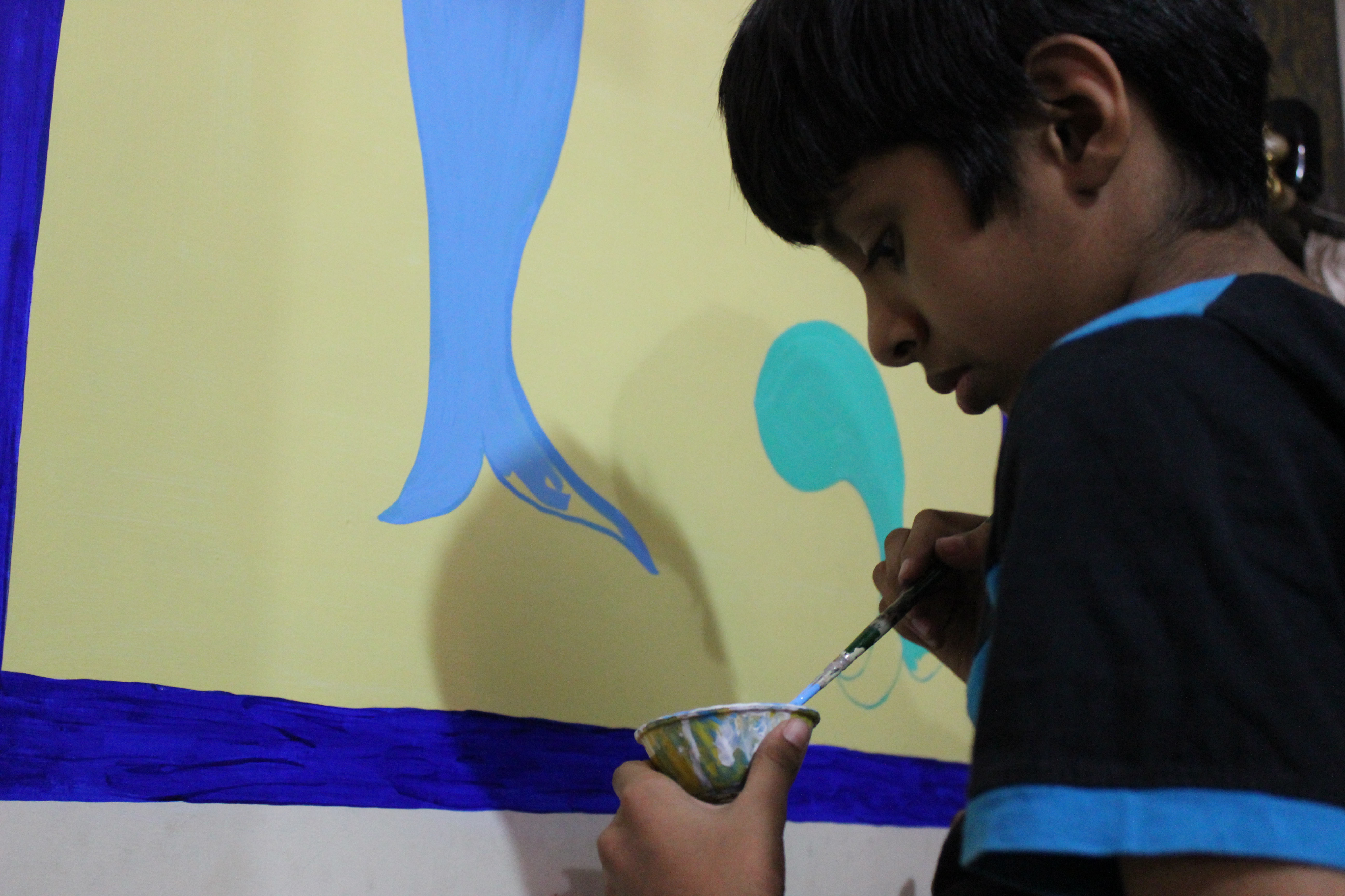 Amrit trying his hands on the painting